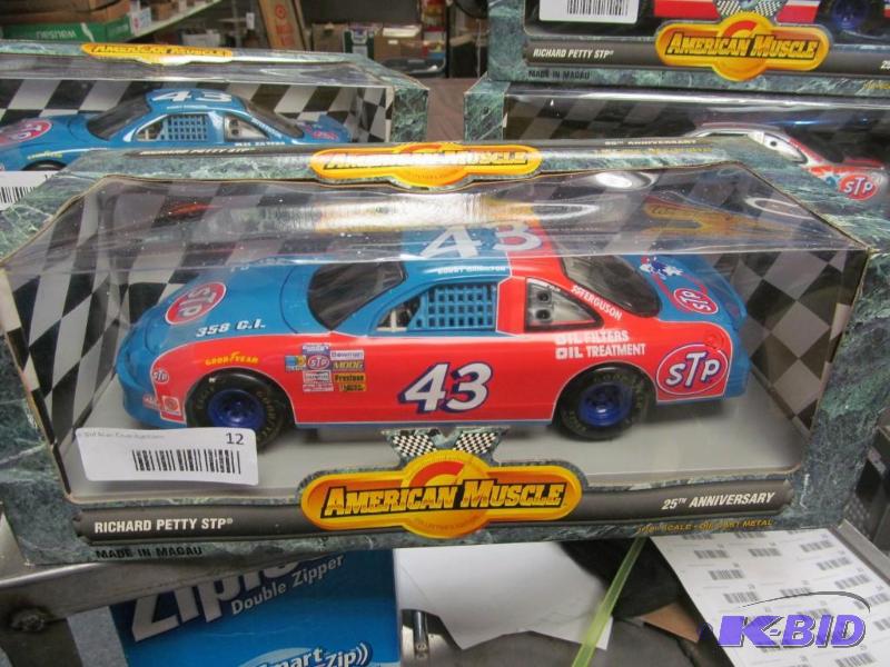 lot 12 image: 1996 Ertl American Muscle #43 Richard Petty STP 25th Anniversary NASCAR 118 Die Cast Car