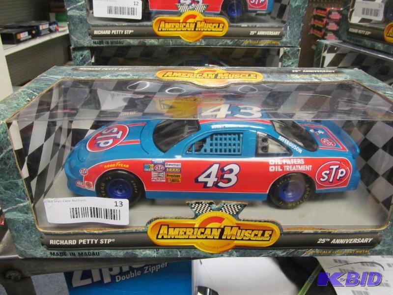 lot 13 image: 1996 Ertl American Muscle #43 Richard Petty STP 25th Anniversary NASCAR 118 Die Cast Car