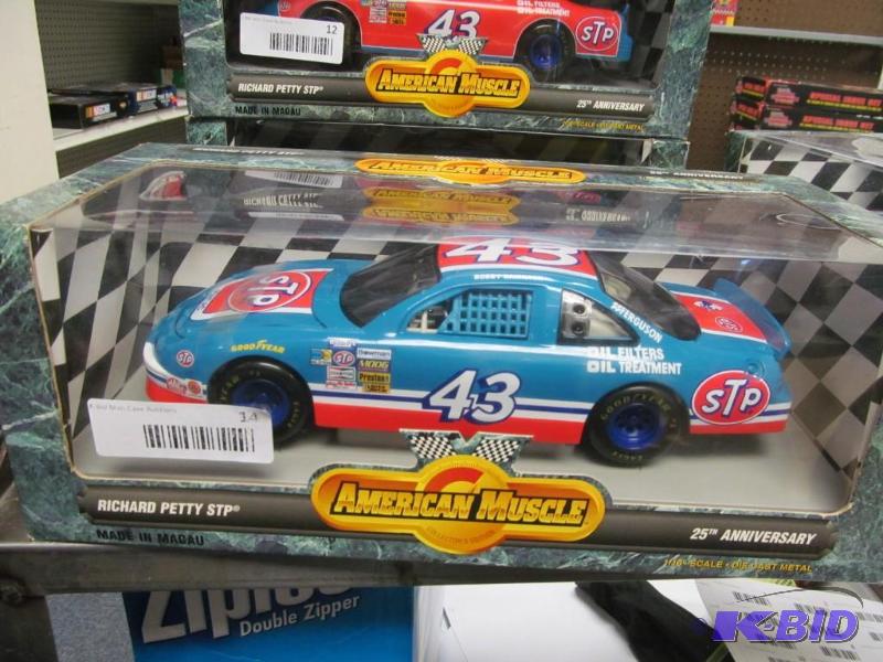 lot 14 image: 1996 Ertl American Muscle #43 Richard Petty STP 25th Anniversary NASCAR 118 Die Cast Car