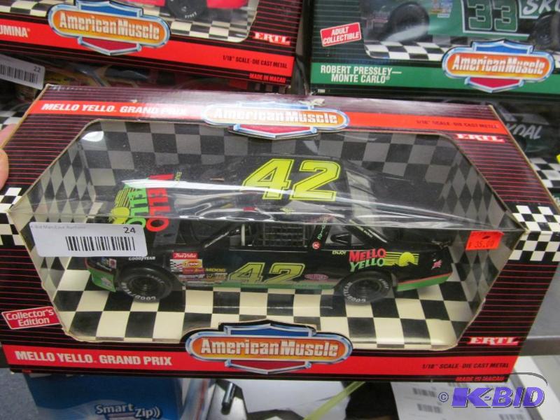 lot 24 image: 1992 Ertl American Muscle #42 Kyle Petty Mello Yellow NASCAR 118 Die Cast Car