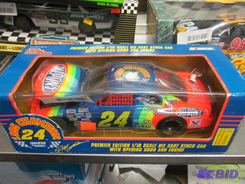 lot 33 image: 1995 Racing Champions #24 Gordon DuPont 95 Champion NASCAR 118 Die Cast Car