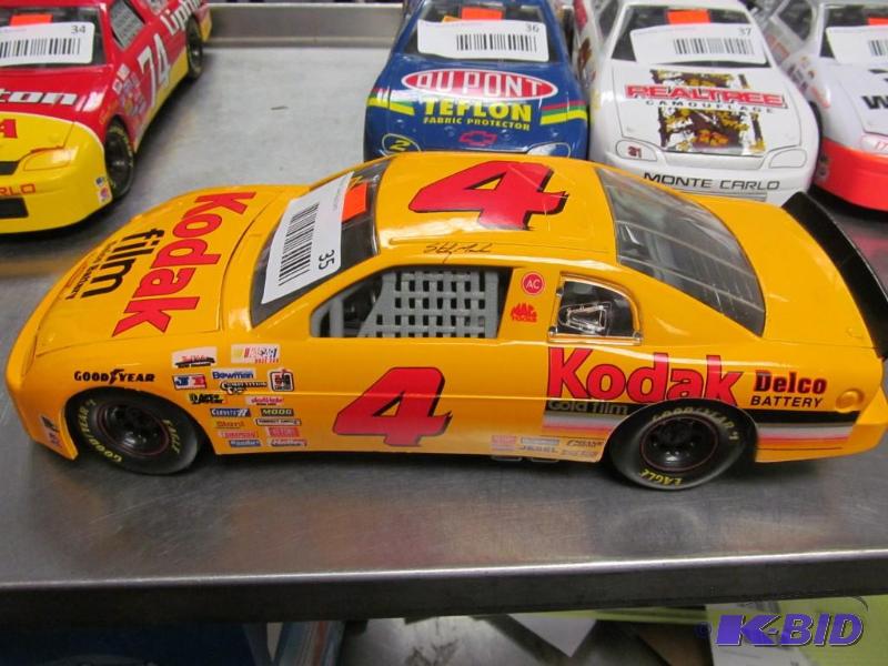 lot 35 image: 1995 Racing Champions #4 Martin Kodak NASCAR 118 Die Cast Car