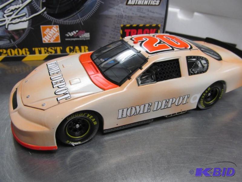 lot 54 image: 2006 #20 Tony Stewart Home Depot Track Tested NASCAR 124 Die Cast Car by Action