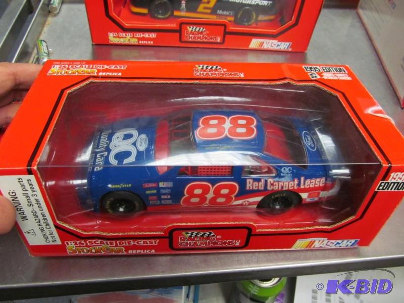 lot 67 image: 1995 #88 Dale Jerrett Ford Quality Care NASCAR 124 Die Cast Car by Racing Champions