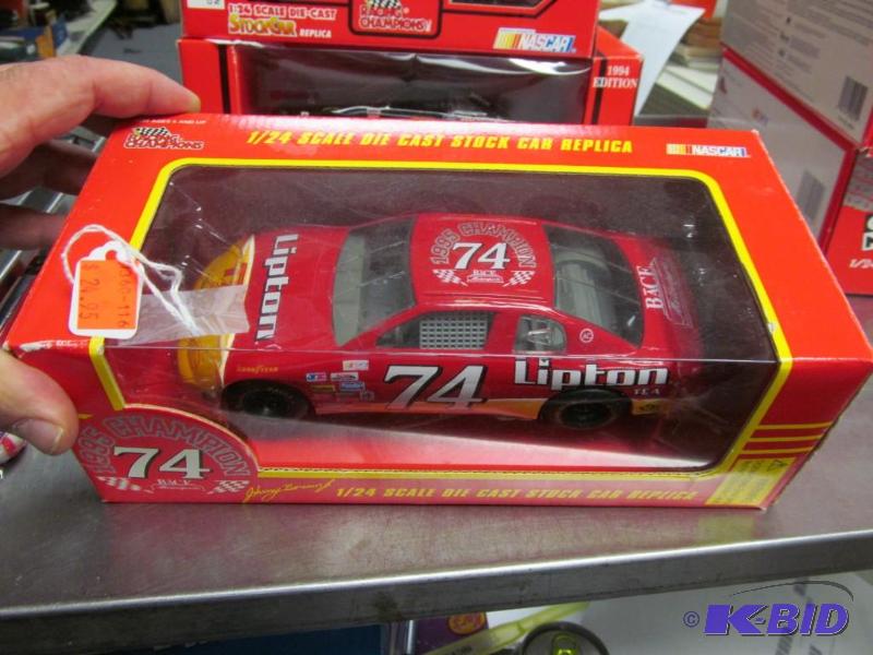 lot 68 image: 1995 #74 Johnny Benson Jr Lipton Ice Tea BACE Champion NASCAR 124 Die Cast Car by Racing Champions