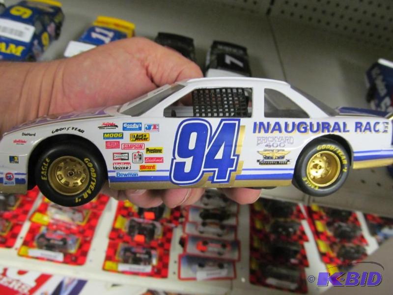 lot 98 image: #94 1994 Brickyard 400 Inaugural Race Loose Racing Champions 124 NASCAR Die Cast Car