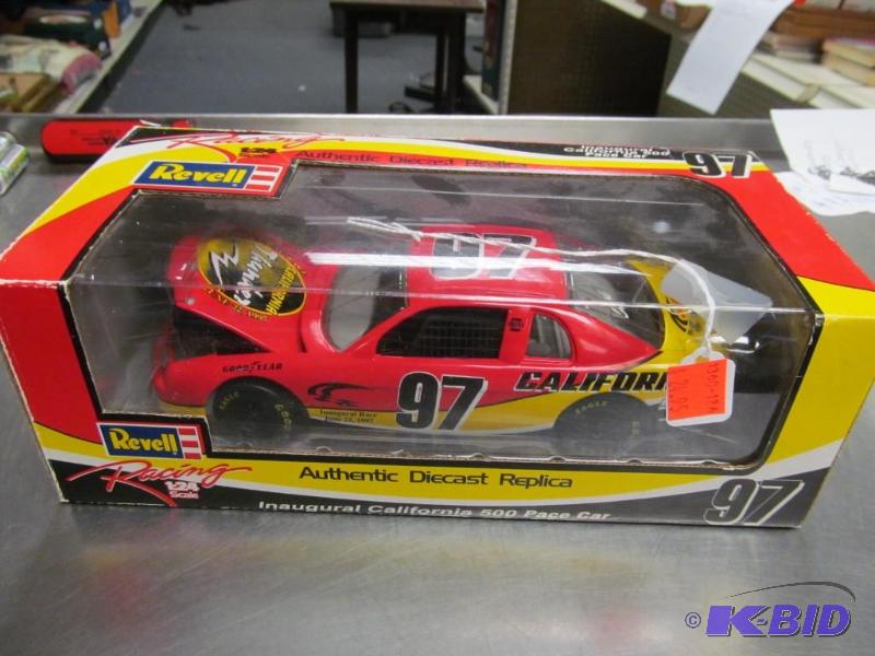 lot 99 image: 1997 #97 California 500 Inaugural Pace Car NASCAR 124 Die Cast Car by Revell