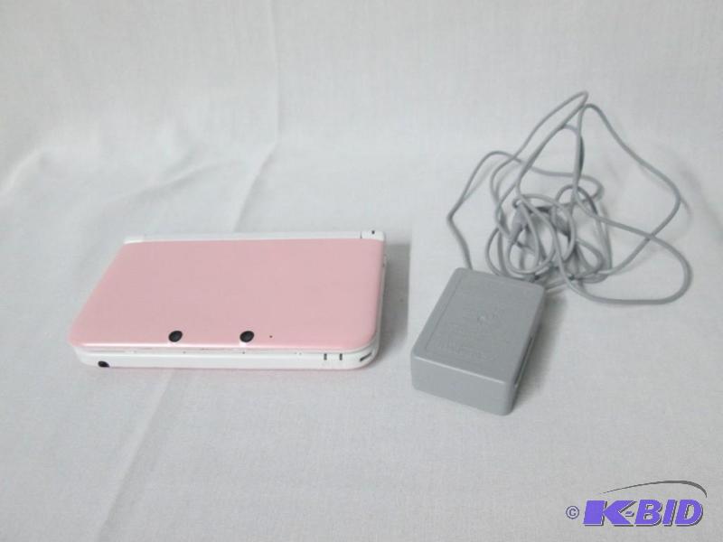 lot 27 image: Nintendo 3DS XL Console in Pink