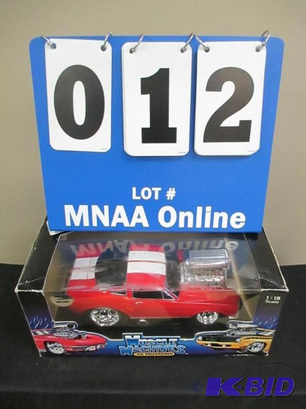lot 12 image: Muscle Machines 66 Mustang Die Cast Car