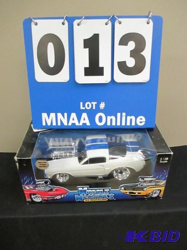lot 13 image: Muscle Machines 66 Mustang Die Cast Car