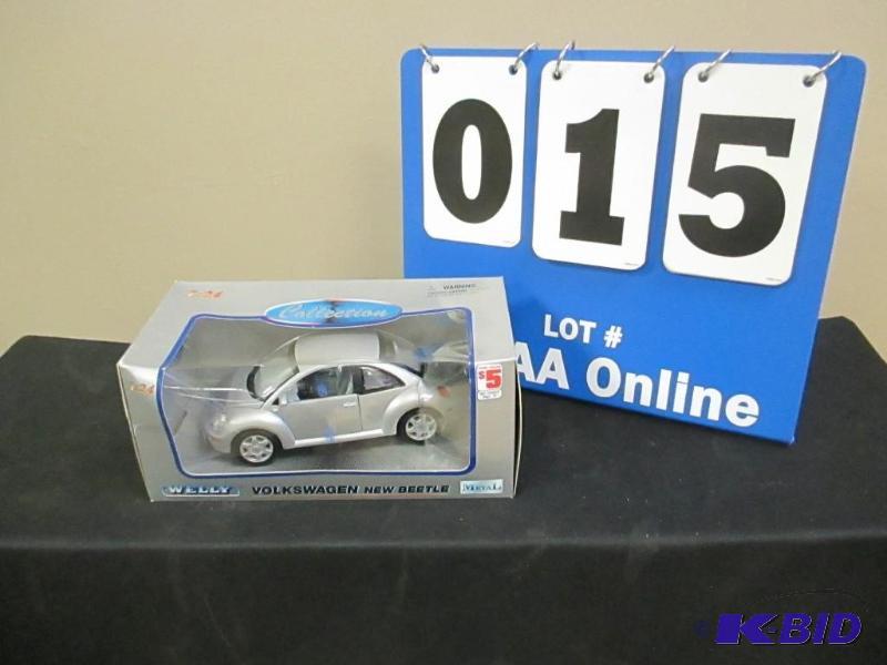 lot 15 image: Welly Volkswagon New Beetle Die Cast Car