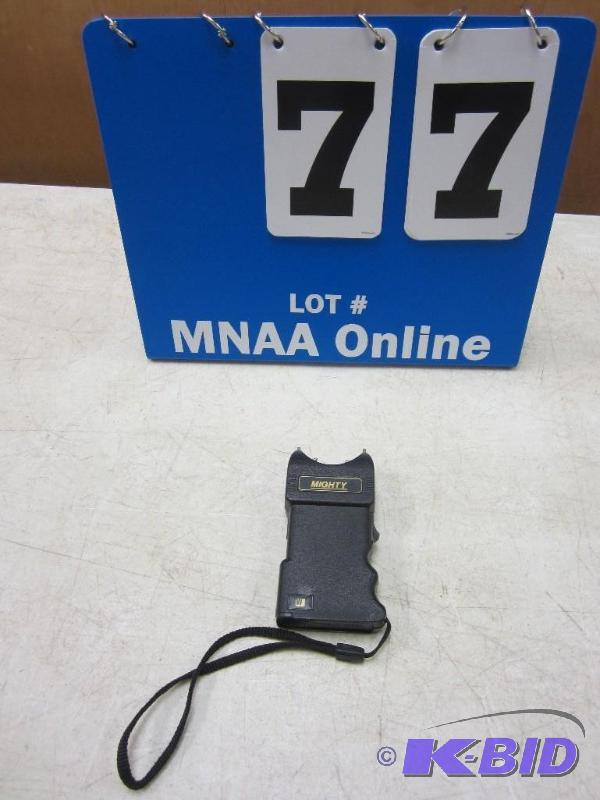 lot 77 image: Mighty Taser Personal Protection Device
