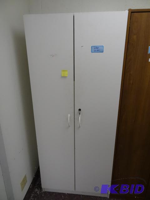 Laminate 2 Door Cabinet. 30 x 16 x 72...