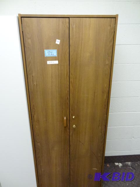 Laminate 2 Door Cabinet. 29 x 15 x 72...