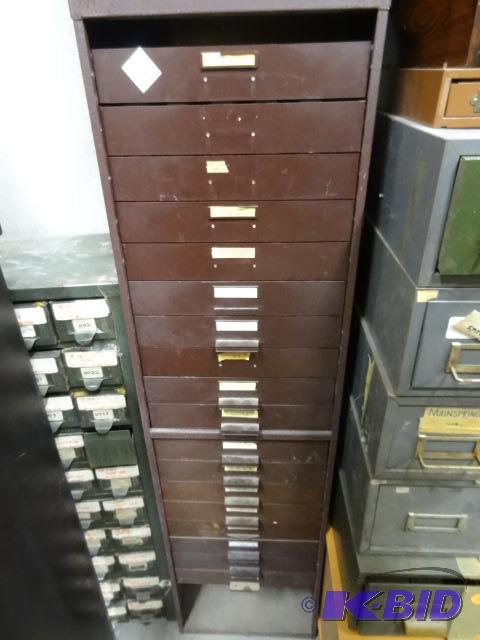 Metal Cabinet with Plastic Drawers. Watch Mak...