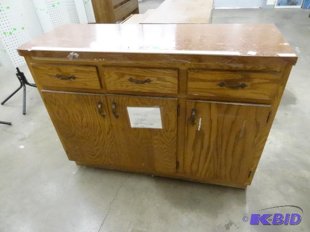 Laminate Wood Cabinet. 3 Drawers and 3 Doors....