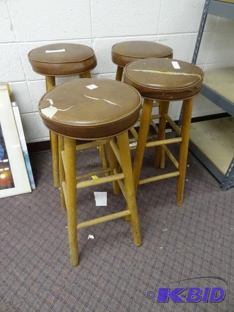 4 Wooden Stools. 2 have ripped seats...