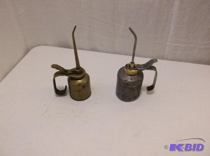 Collectable oil squirt cans one of the caps i...