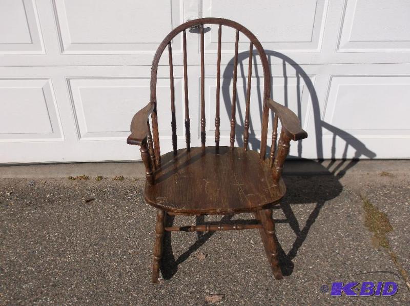 Solid oak hoop back rocking chair measuring 2...