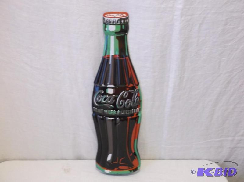 Embossed metal Coca Cola sign measuring 6 18...