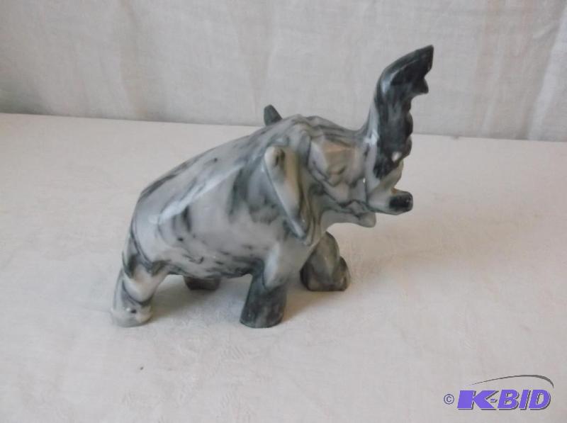 Rock carved elephant measuring 5 12&quot L ...