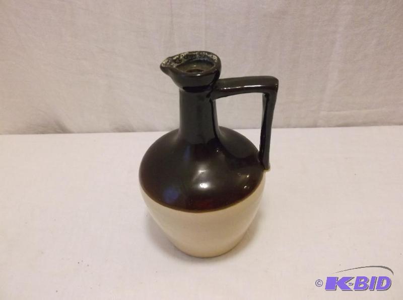 Brown top crock pitcher in good collectable c...