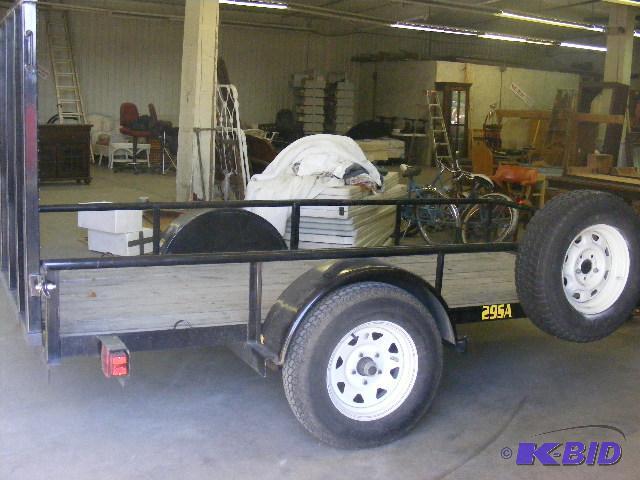 lot 20043 image: Big Tex Utility Trailer Rims are 15 x 5 bol...
