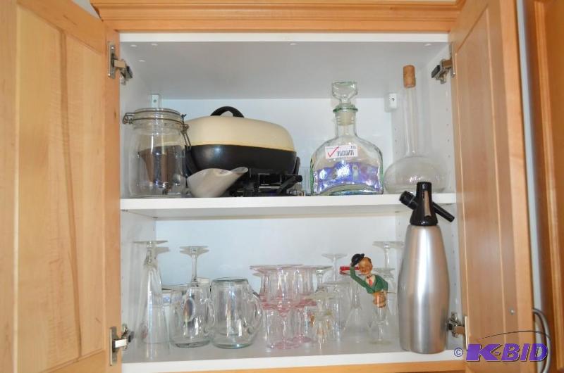 lot 102 image: Contents of 2 shelves in 1 cupboard Goblets, ...
