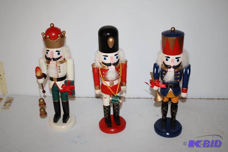 lot 145 image: 3 Wood nutcrackers 13" tall...