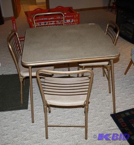 lot 169 image: Folding table and 4 folding chairs...