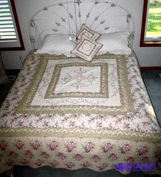 lot 2 image: Large beautiful QUILT- quilt is on a king bed...
