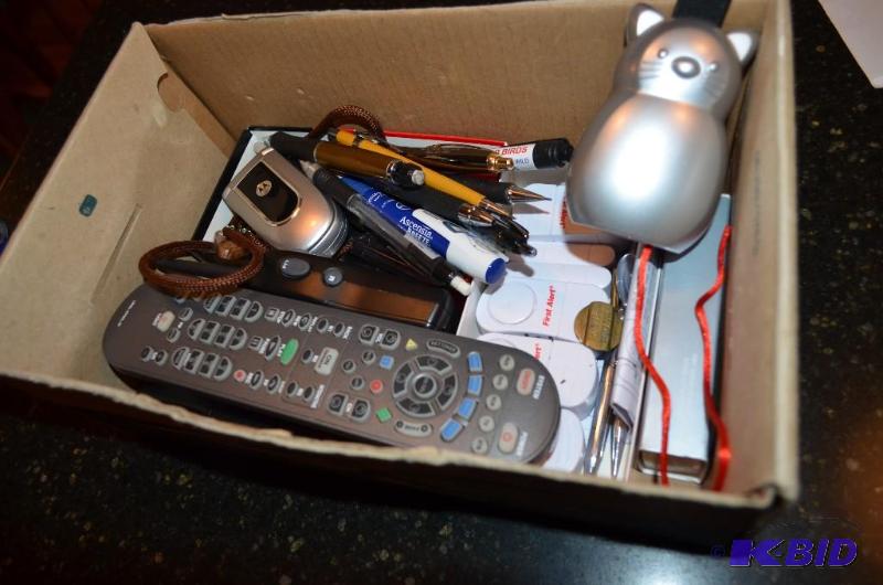 lot 212 image: 2 Walkie talkies, First Alert, cell phone, re...
