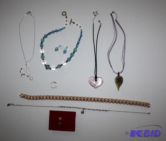 lot 23 image: Very nice costume jewelry. Matching Heart pen...