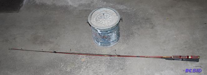 lot 236 image: Vintage two fishing poles and Vintage Falls C...