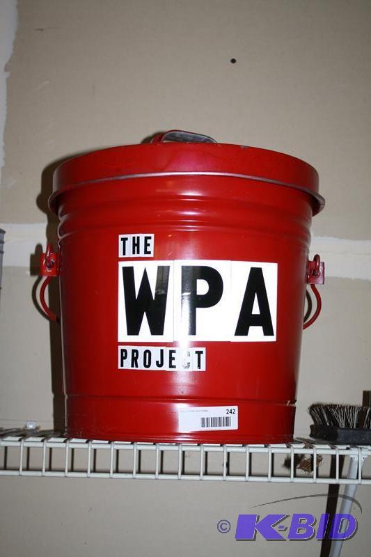 lot 242 image: Metal trash can 10" tall...
