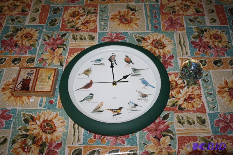 lot 266 image: Bird clock 12" diameter sings bird songs...