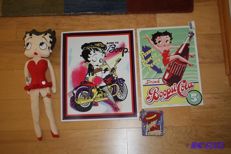 lot 45 image: Betty Boop doll, pictures, and tin box on key...