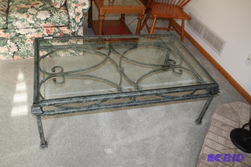 lot 48 image: Green rod iron coffee table with beveled edge...