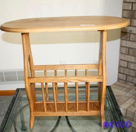 lot 50 image: Light Wood side Table with Magazine rack bott...