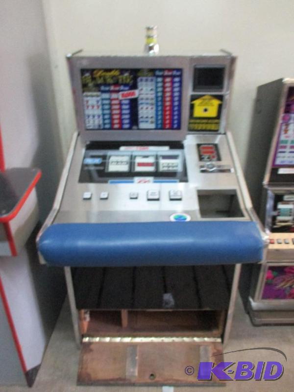 lot 13 image: Double Black Tie slot machine, works...