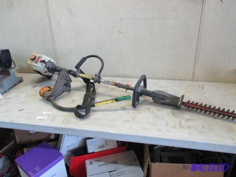 lot 37 image: Ryobi weed whip with hedgetrimmer attachment...