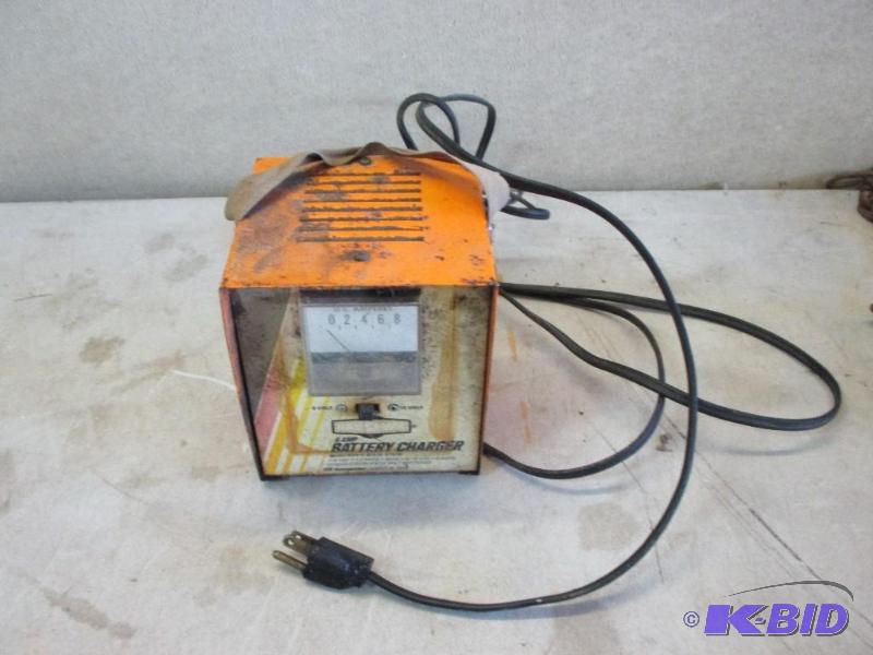 lot 41 image: battery charger...