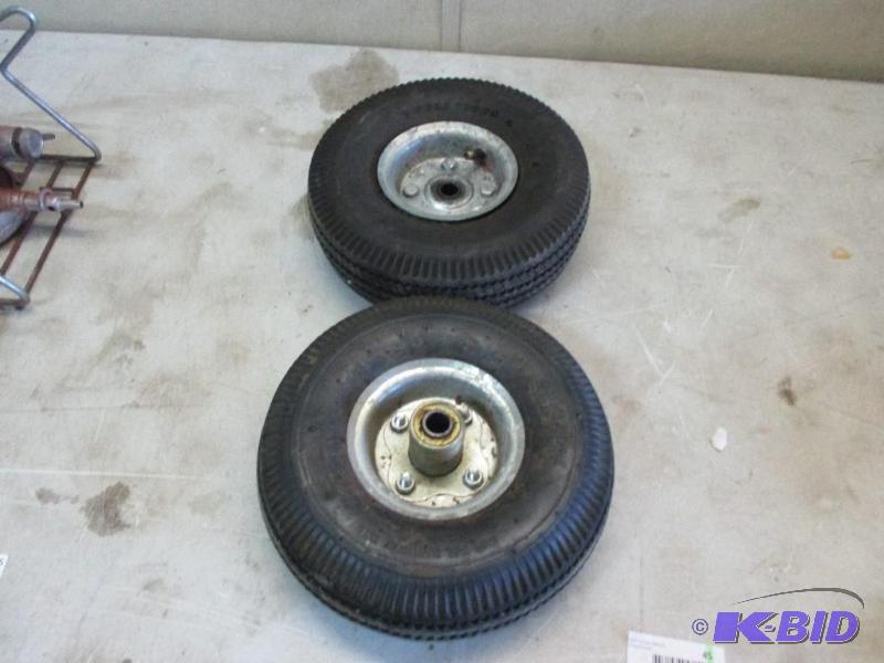 lot 45 image: 2 cart wheels and tires...