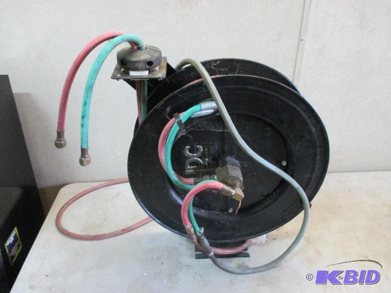 lot 82 image: torch hose and reel, good condition...