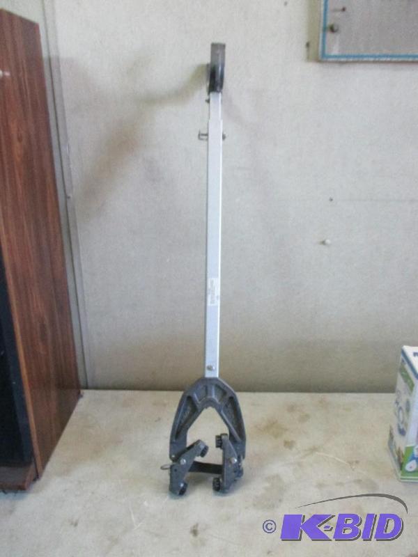 lot 93 image: Outboard motor brace...