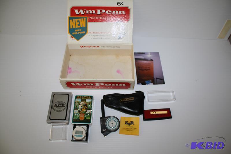 DeLaval advertising items clock, tie clip, m...