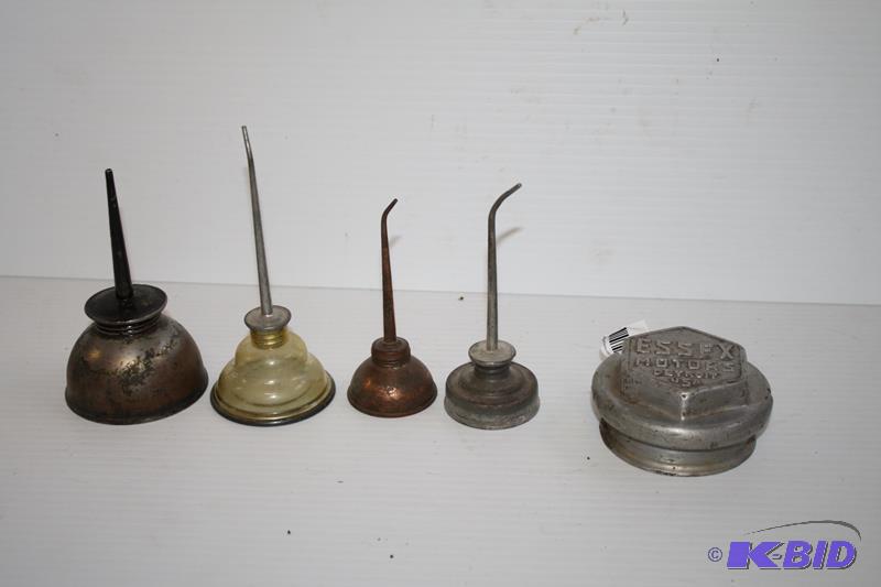 Four vintage oil cans &amp Essex motors vint...
