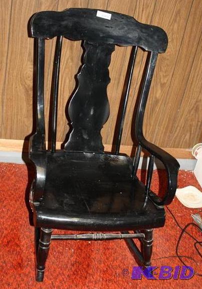 Vintage black wooden rocking chair...