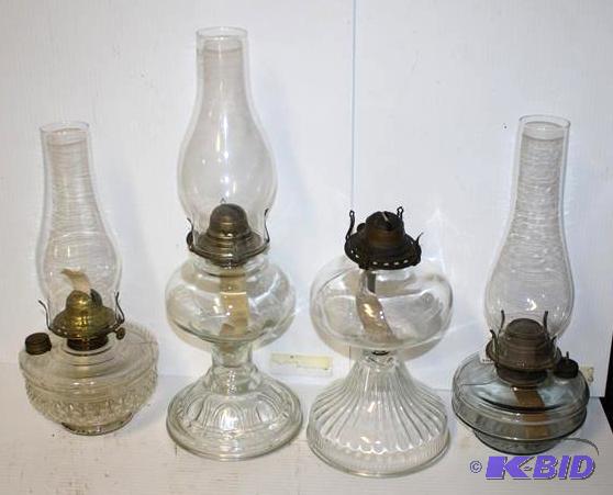 4 glass kerosene lamps , tallest is 20&quot ...