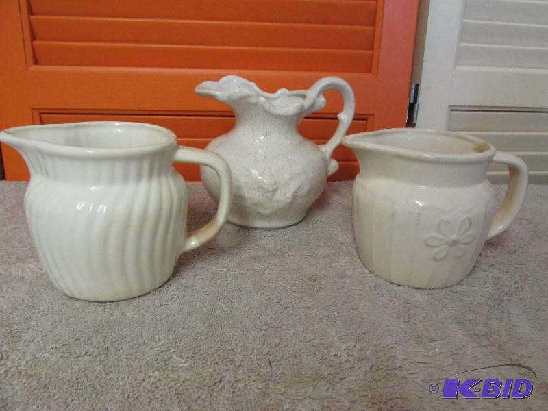 Beautiful Vintage 3 smaller Pitchers